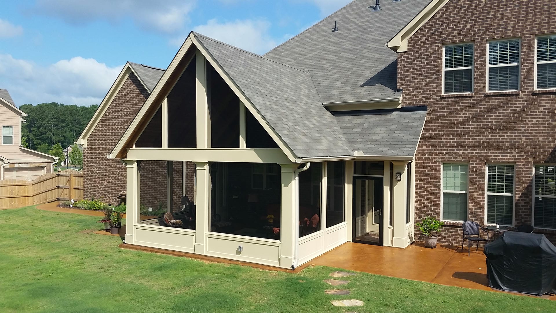 Combination gable and shed porch roof on a brick North Atlanta home
