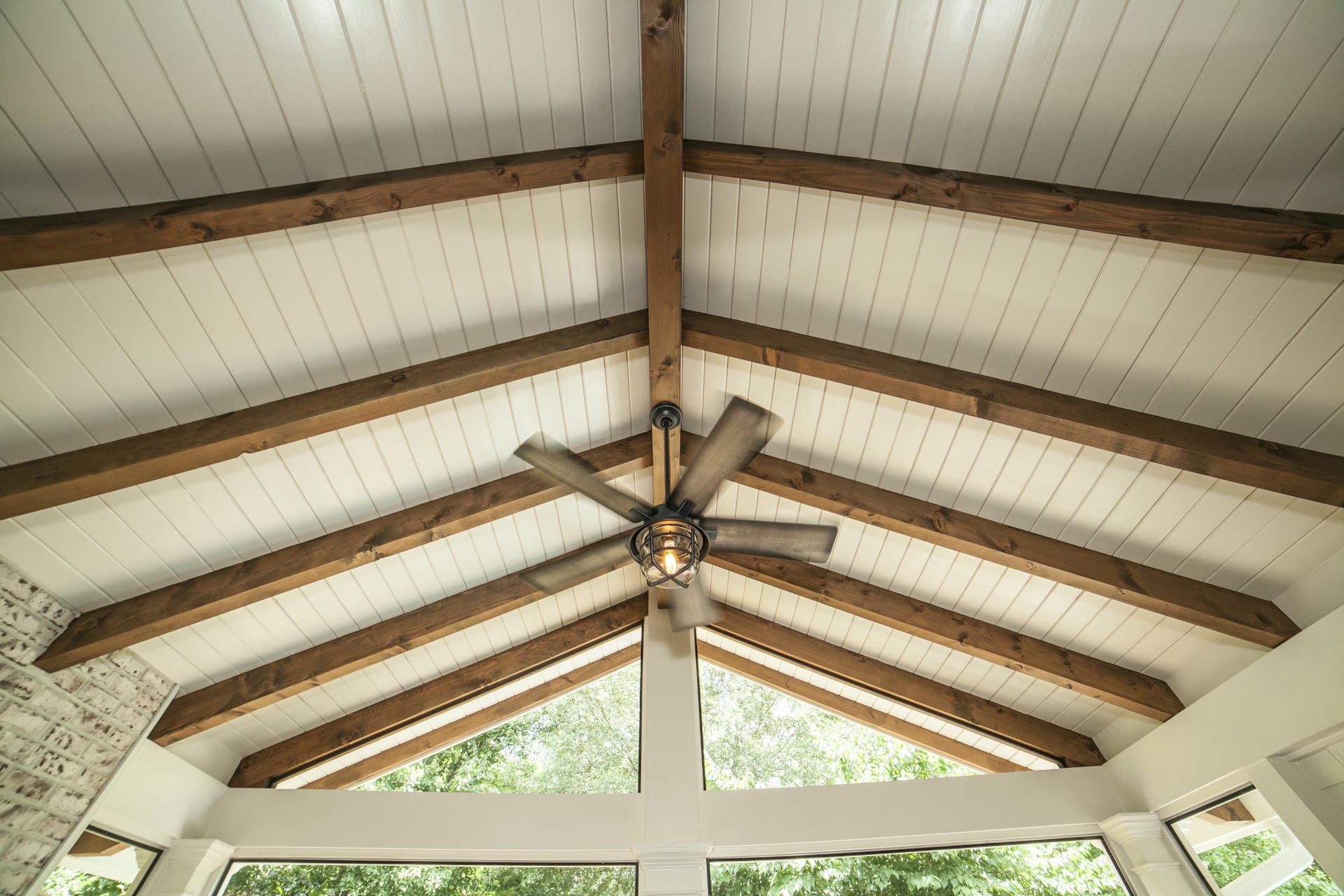 Exposed cedar rafter porch ceiling with tongue and groove decking