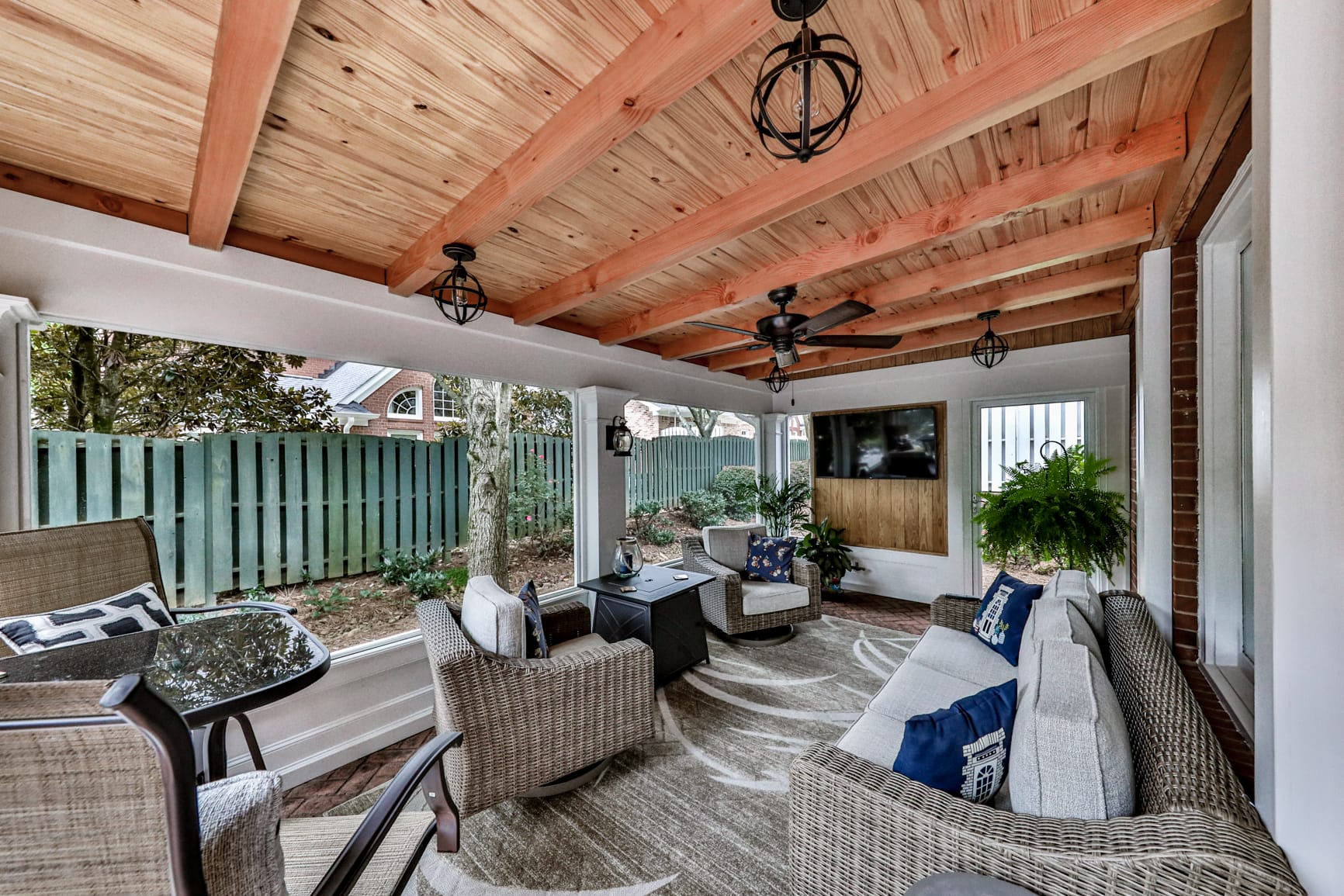 Vaulted porch ceiling with exposed cedar rafter beams