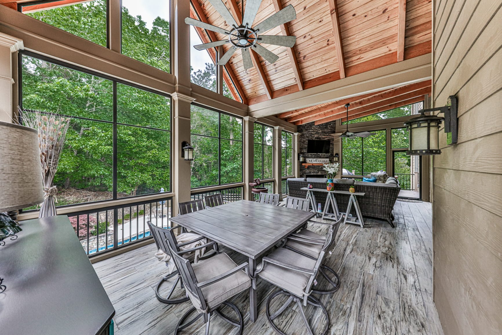 Gable porch roof framed with exposed cedar rafters