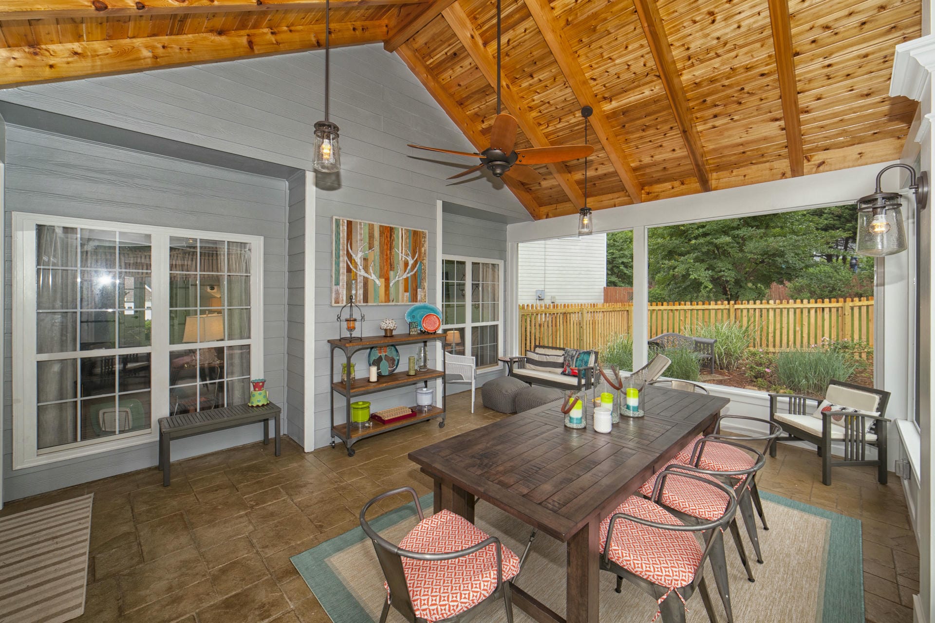 Porch interior finished with exposed cedar rafters