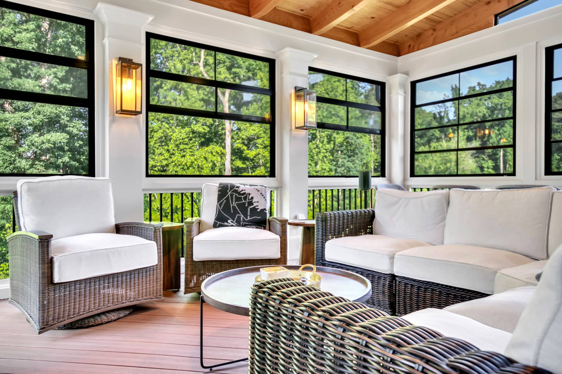 Screened porch enclosed with EZE-Breeze windows for year-round use