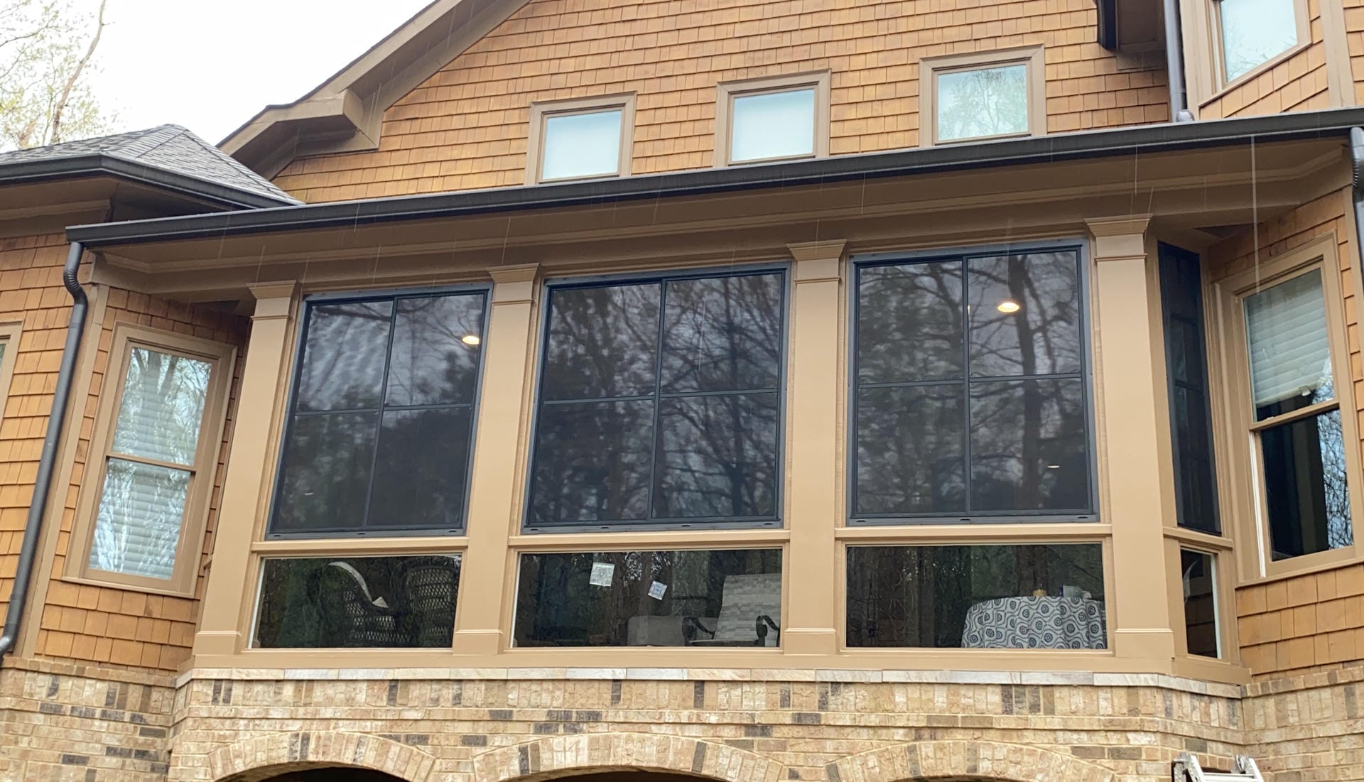 Exterior elevation of an EZE-Breeze and tempered glass porch enclosure