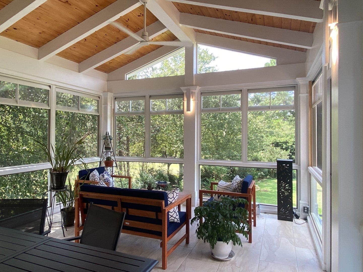 Interior of an EZE-Breeze porch enclosure with tempered glass panels closed