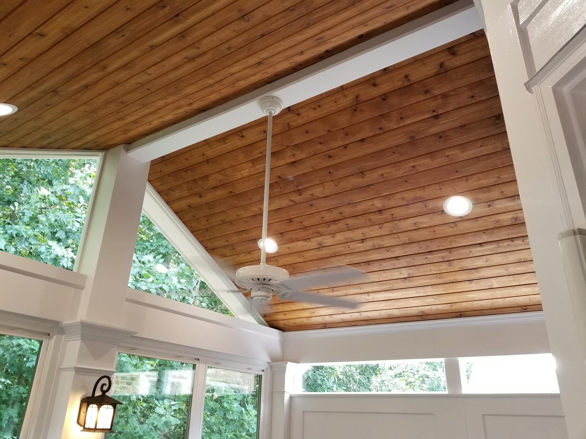 Painted tongue and groove ceiling on a screened porch in North Atlanta
